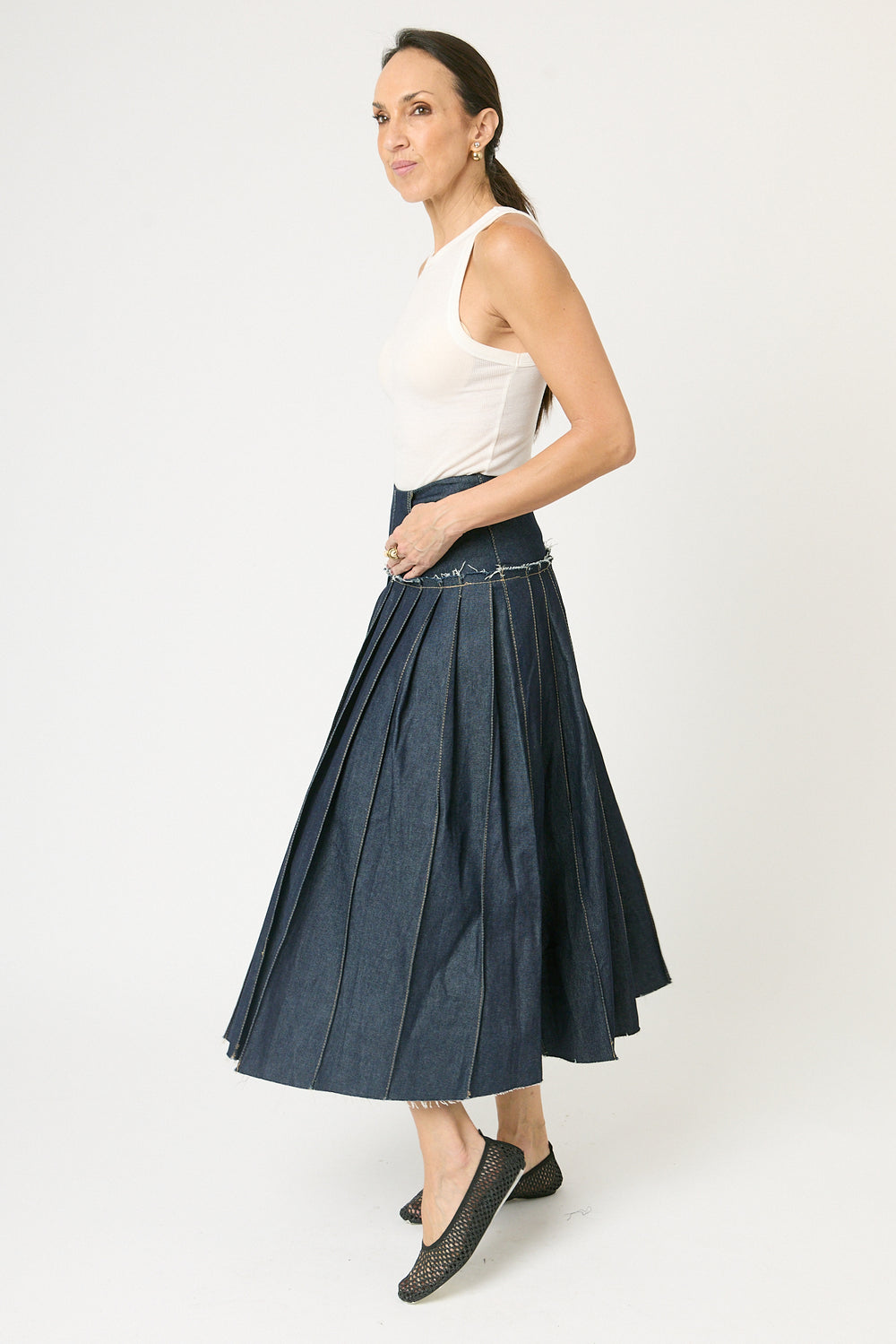 Falda midi denim detalle tablas