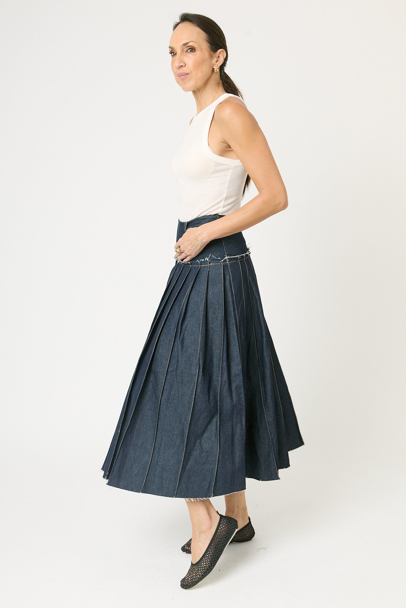 Falda midi denim detalle tablas